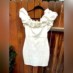 White Off the shoulder mini dress, with ruffled neck and bodycon fitting